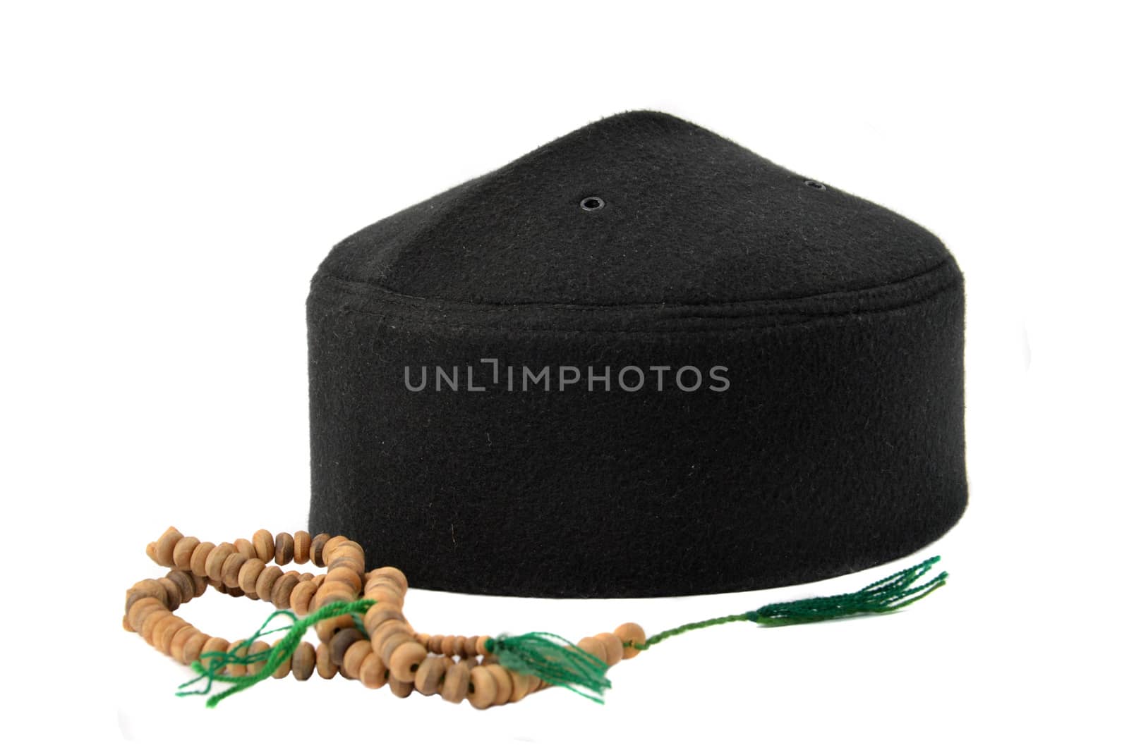 songkok, a traditional hat for male Muslim on white background