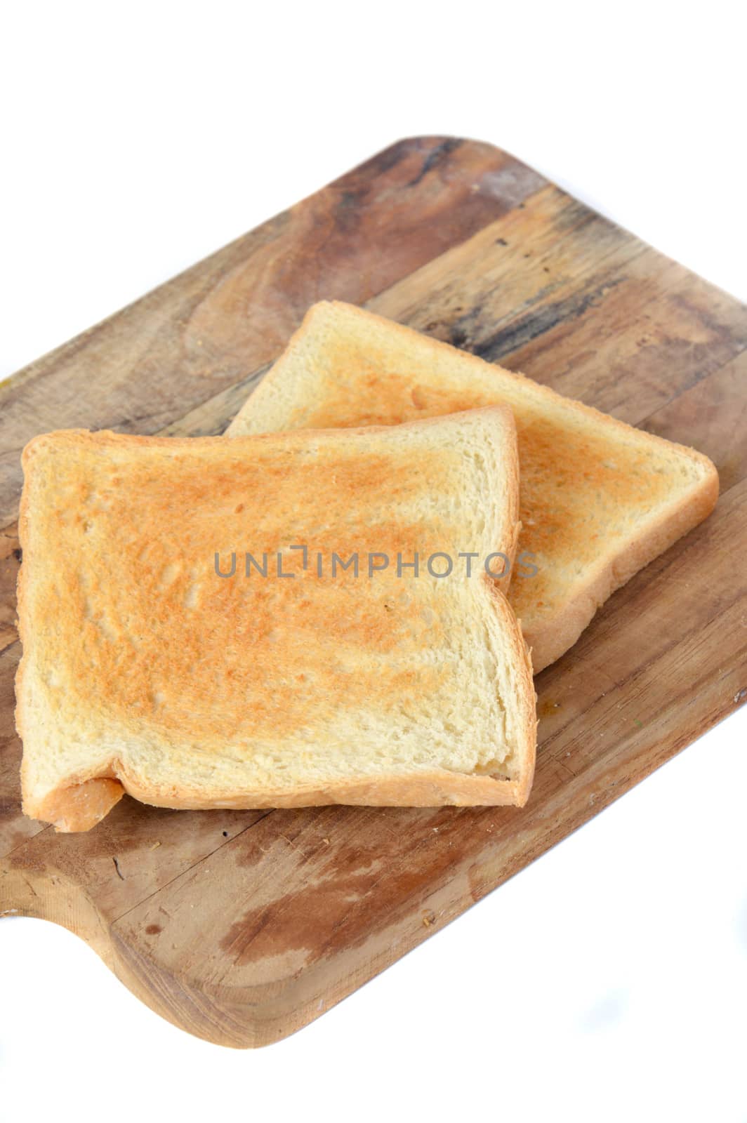toast on board chopped with white background