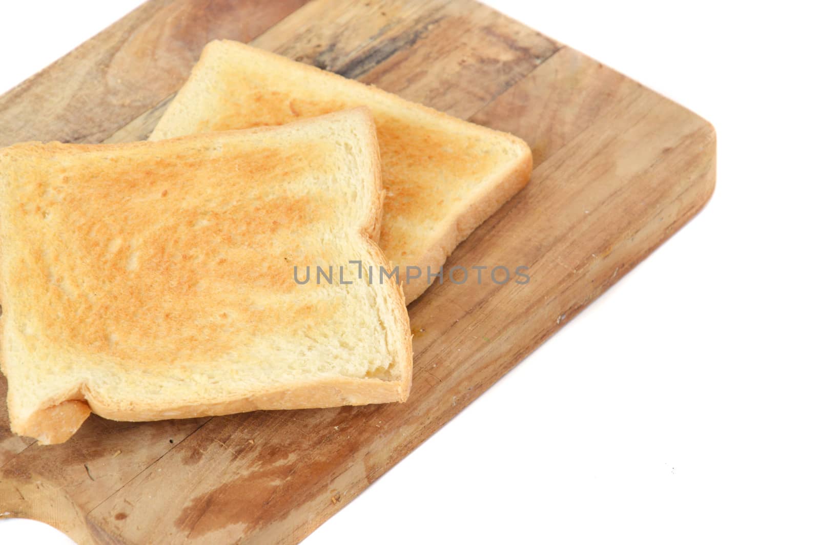 toast on board chopped with white background