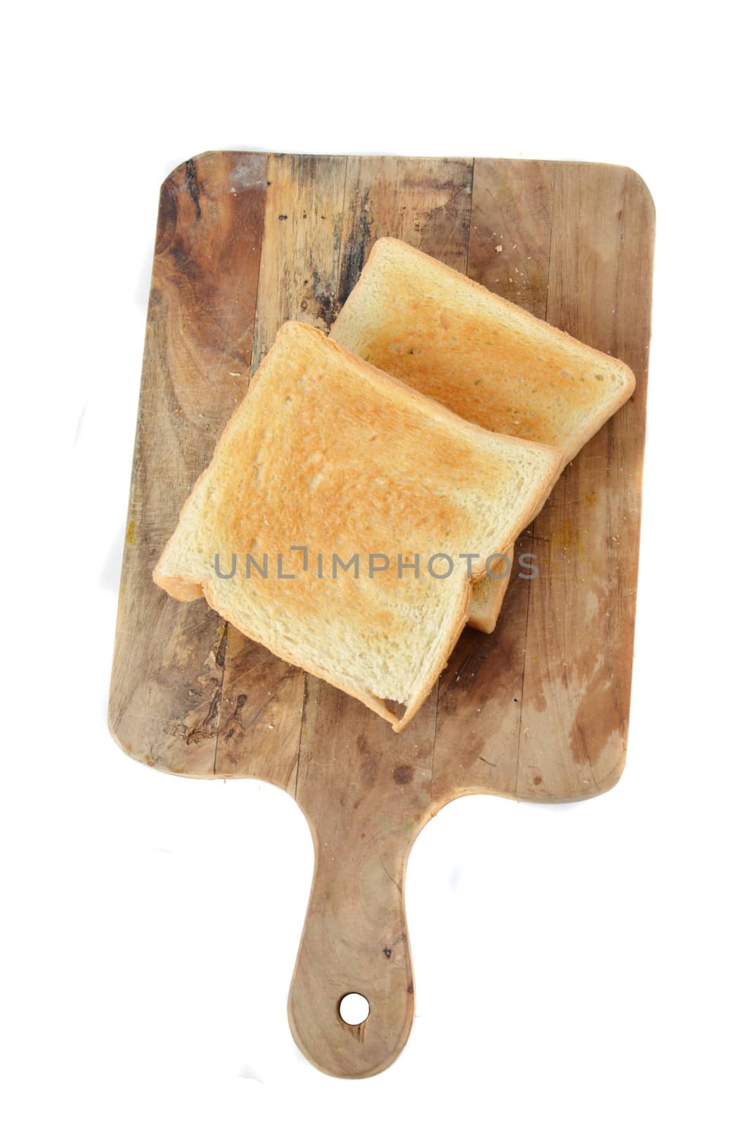 toast on board chopped with white background
