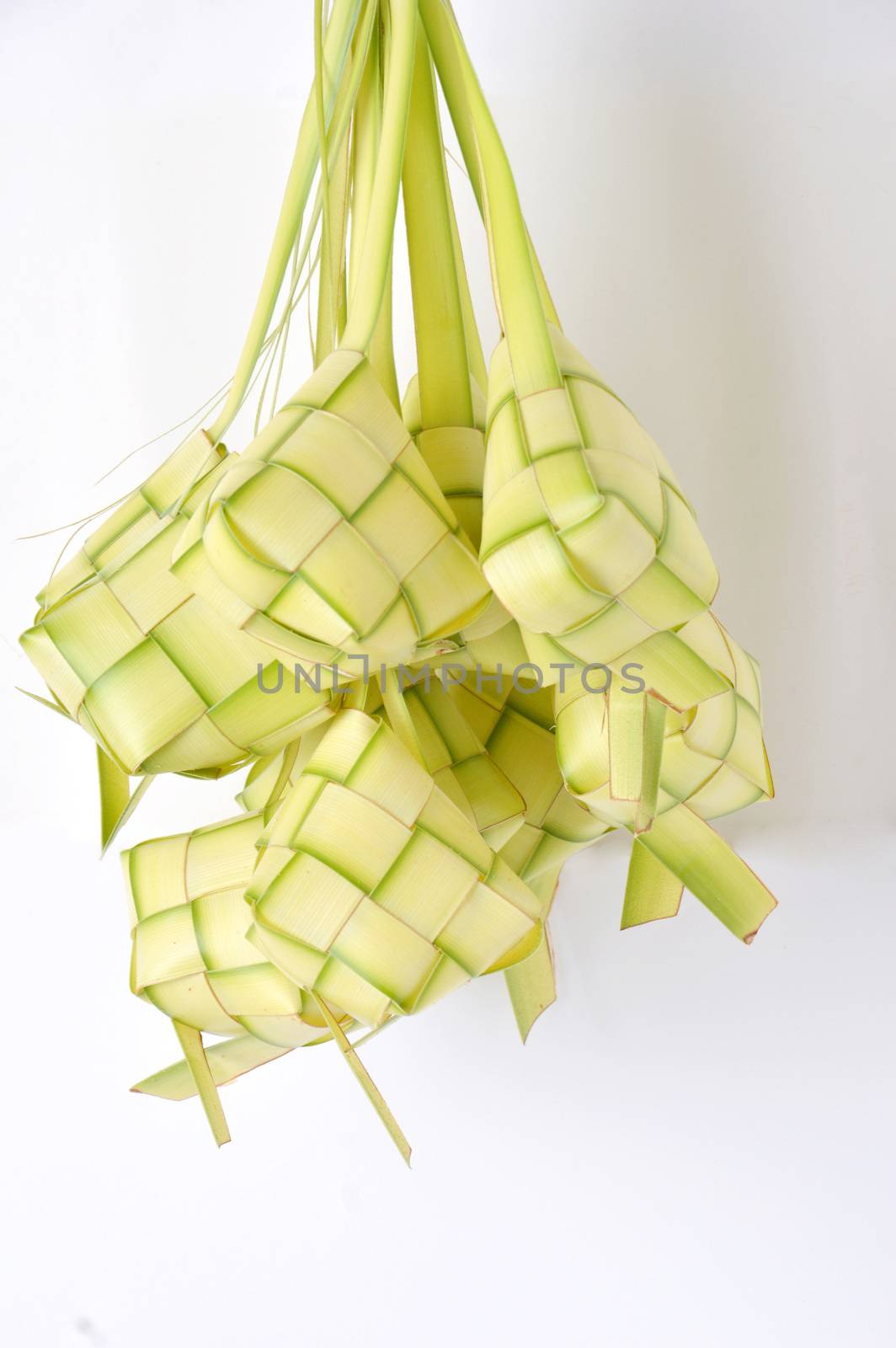 new leaf woven ketupat on white background