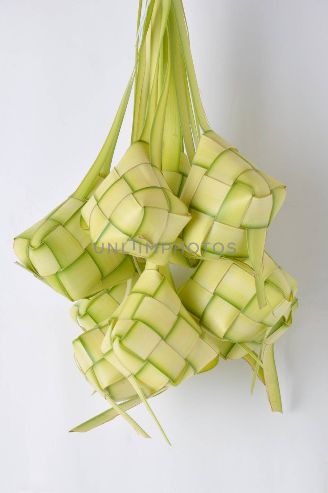 new leaf woven ketupat on white background