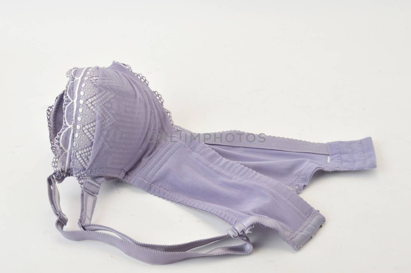 purple bra on white background