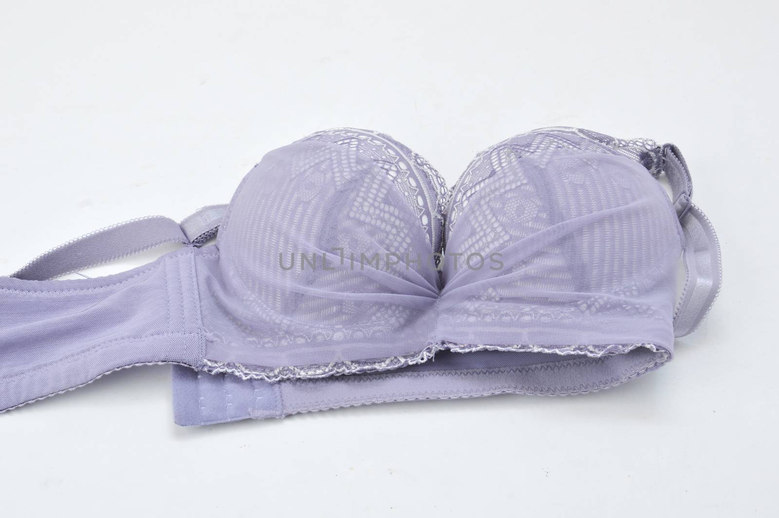 purple bra on white background