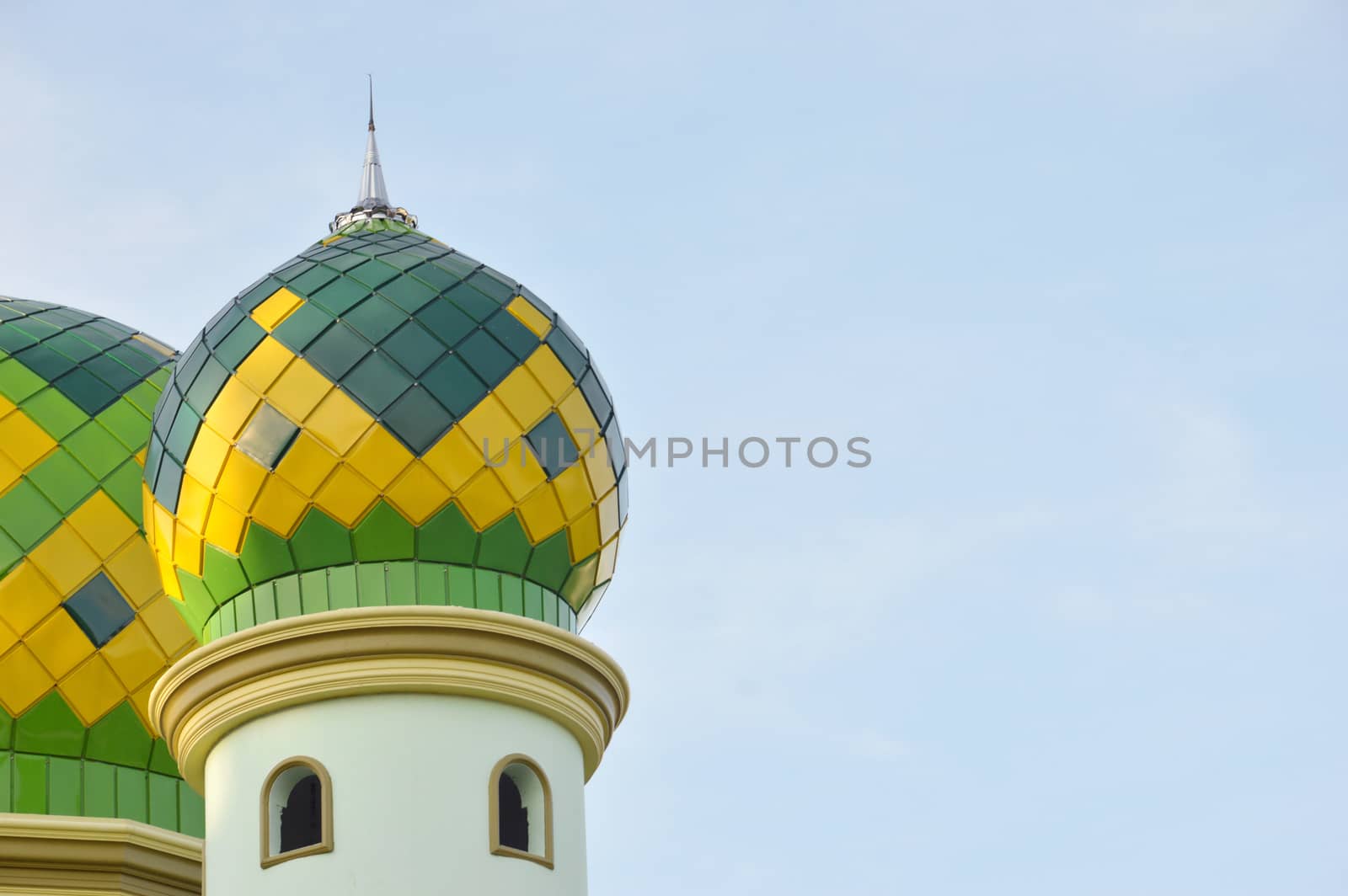 the dome of mosque against blue sky