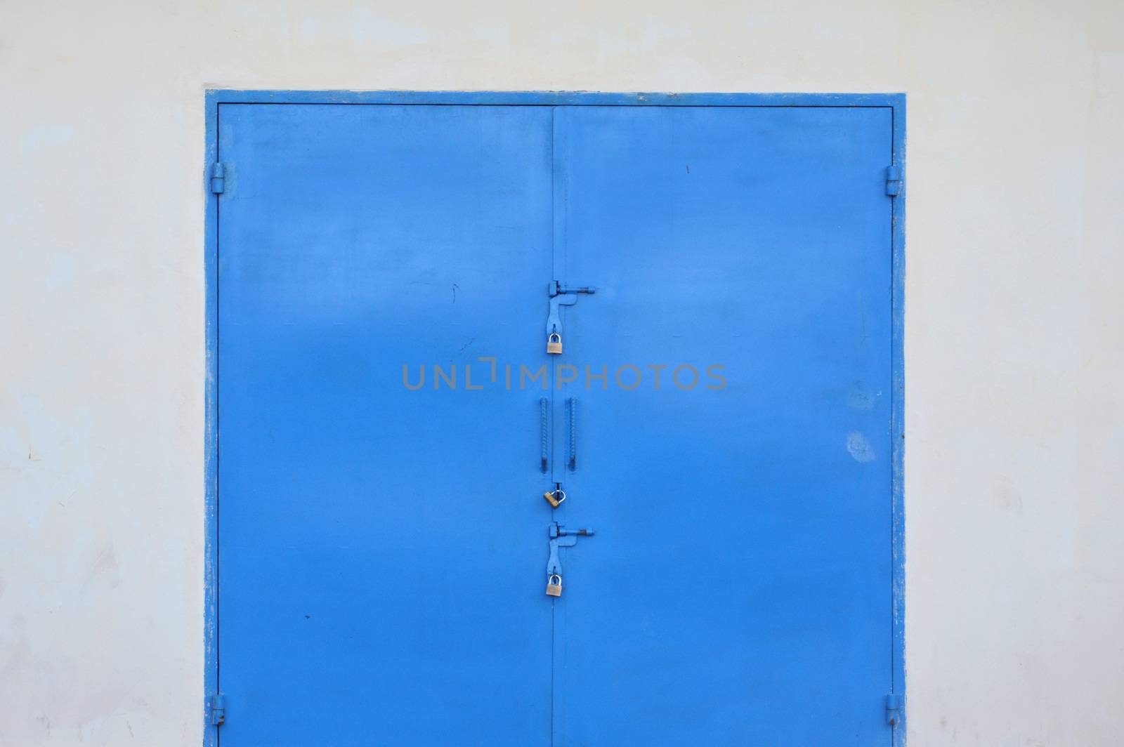 blue iron door on the warehouse