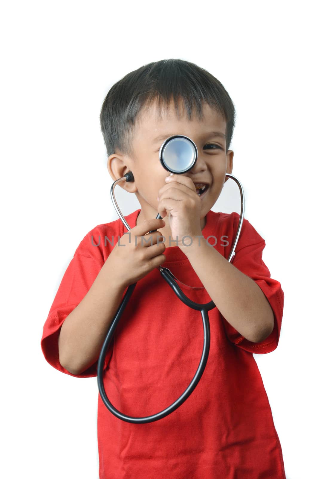 asian little boy holding a stethoscope by antonihalim