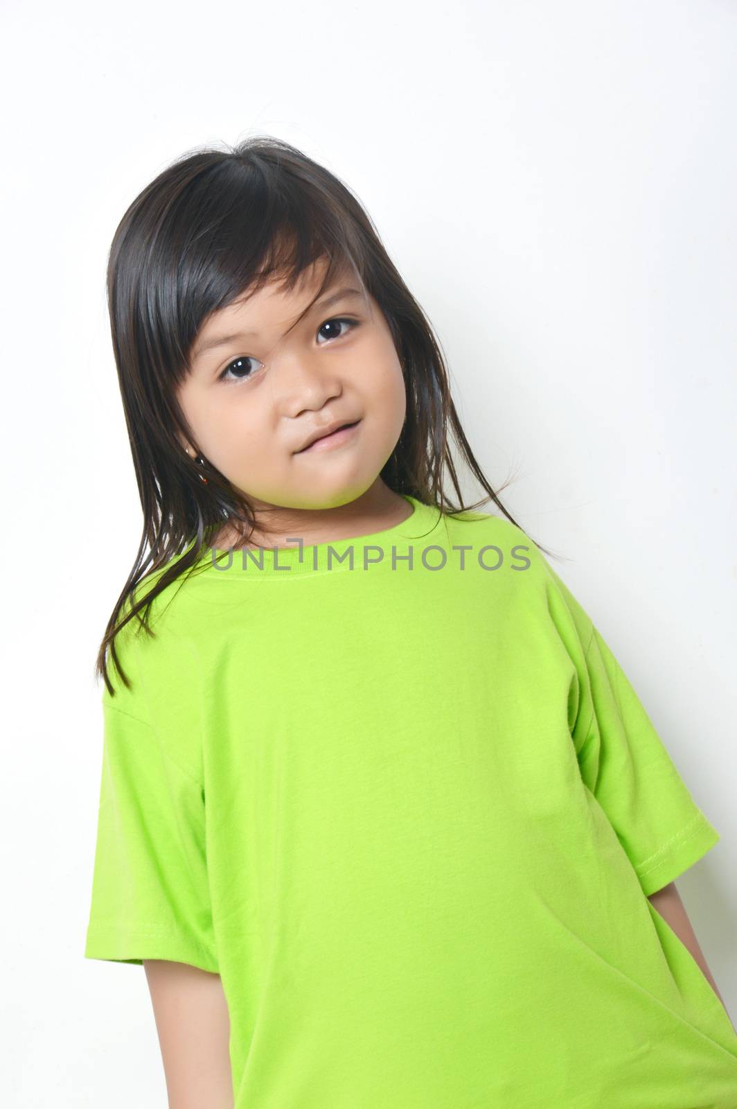 expression asian little girl with green clothes