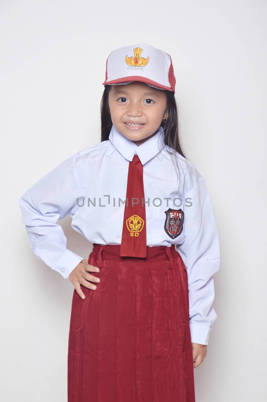 expression asian little girl with primary school uniform