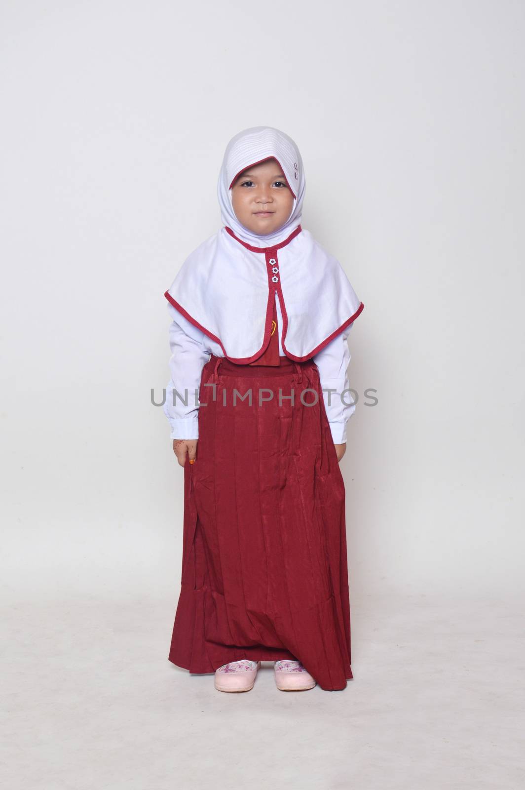 expression asian little girl with primary school uniform