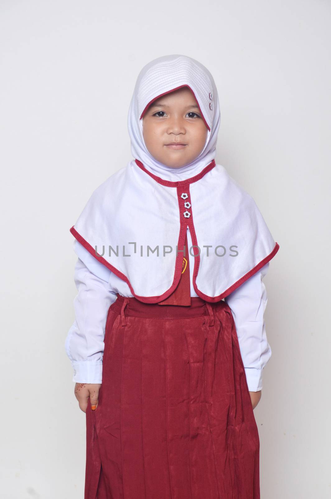 expression asian little girl with primary school uniform