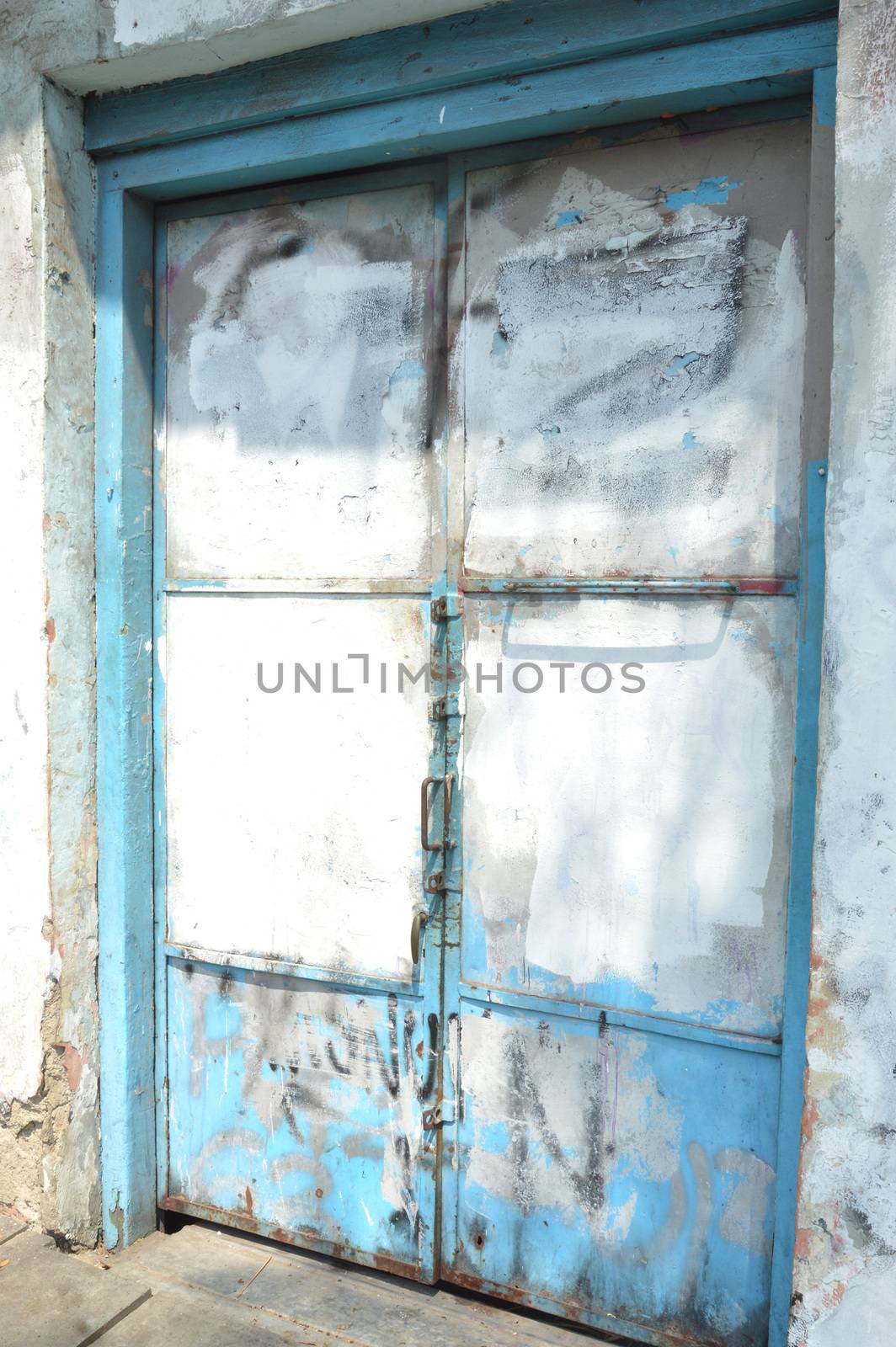 old blue iron door