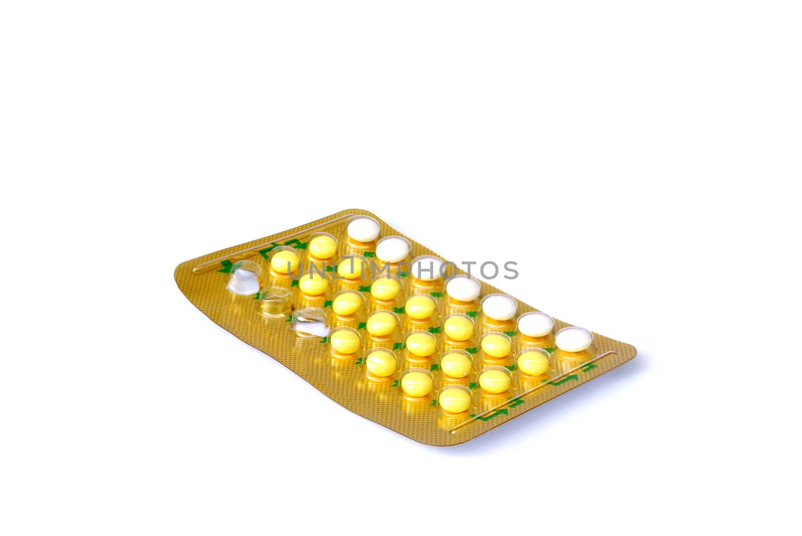 28 pill contraceptives on white background.