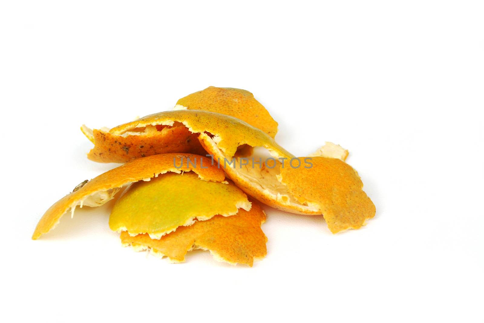 Orange peel on white background.