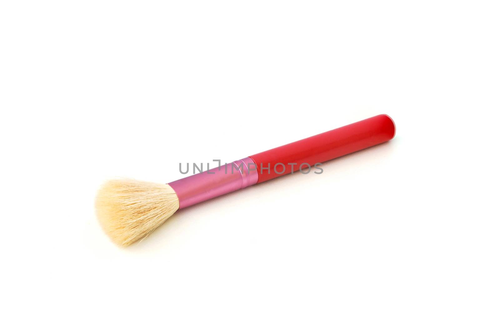 Background cosmetic equipment.Blush brush on white background.