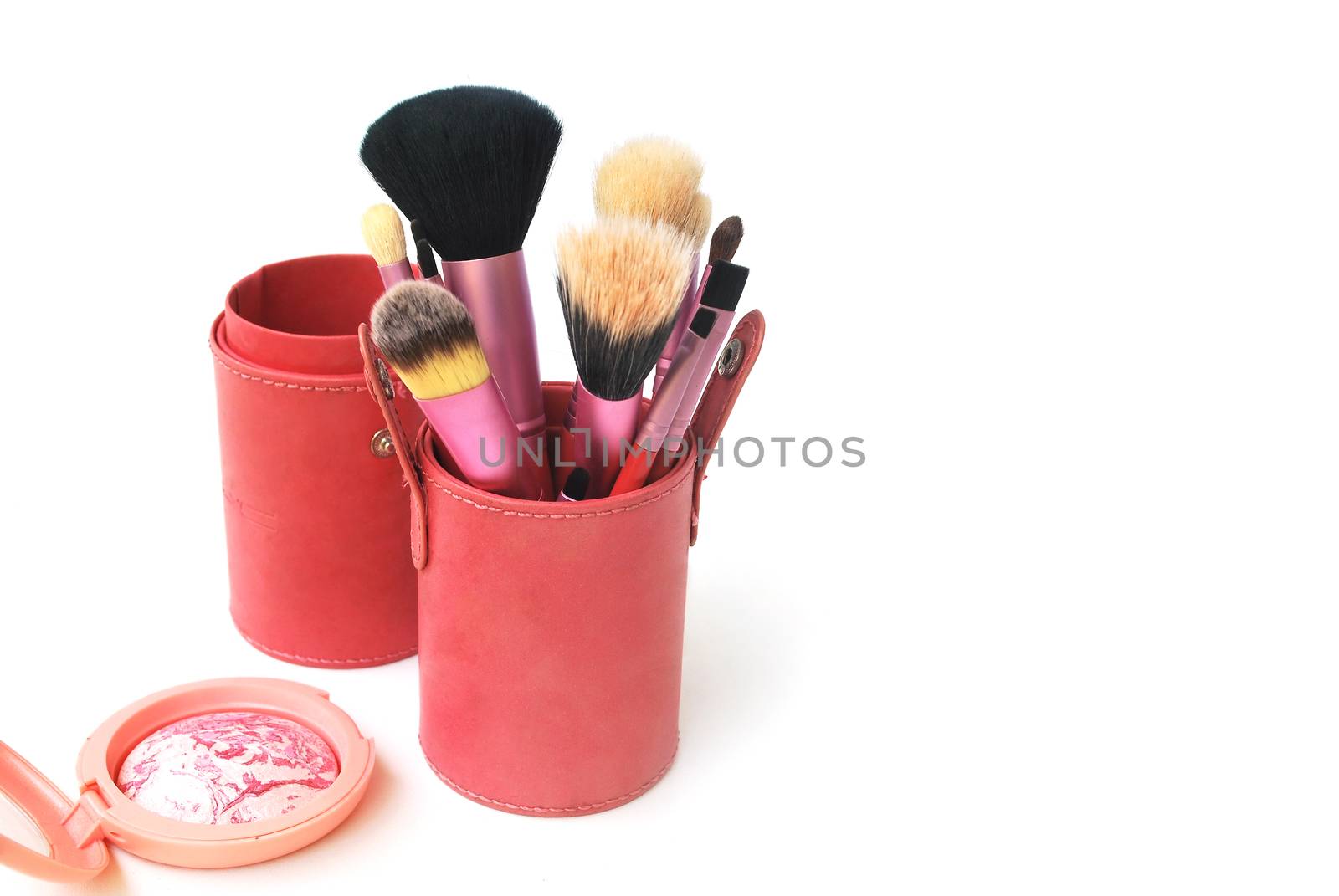 Background cosmetic equipment.Blush brush on white background.