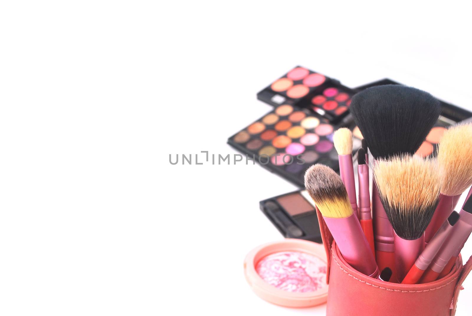 Background cosmetic equipment.Blush brush on white background.