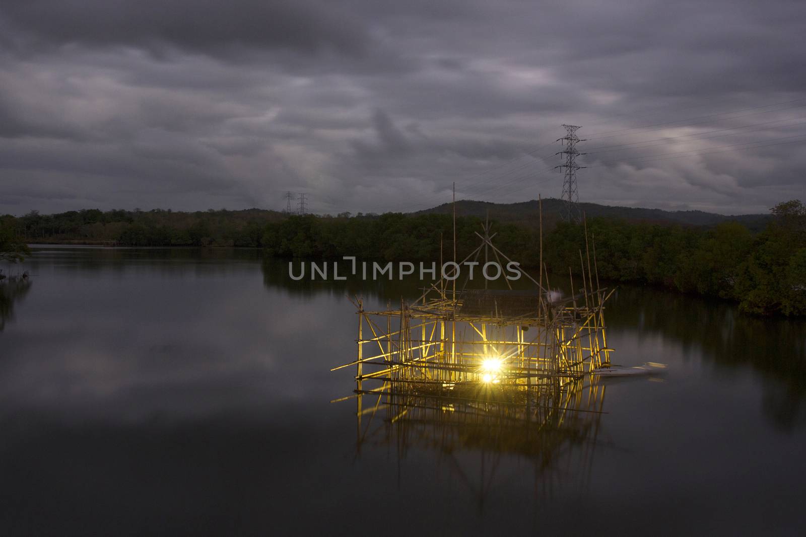 Bagang Fisherman,  a structure build from bamboo for to catch fish at Karajae estuary Pare-pare Indonesia