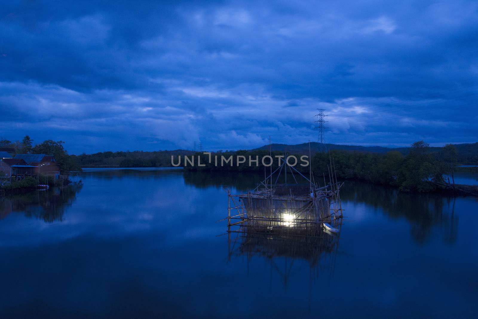 Bagang Fisherman,  a structure build from bamboo for to catch fish at Karajae estuary Pare-pare Indonesia