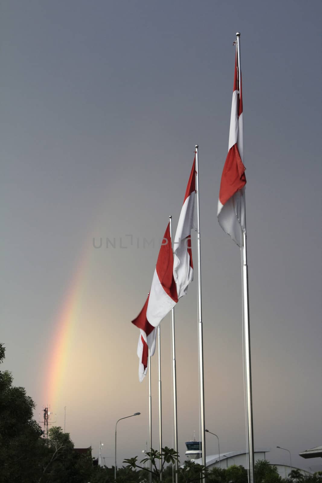 Indonesia's flag against blue sky