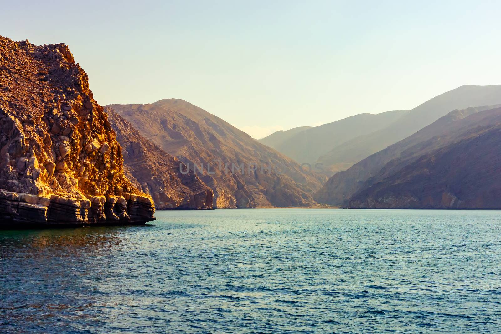 Sea and rocky shores in the fjords of the Gulf of Oman.
