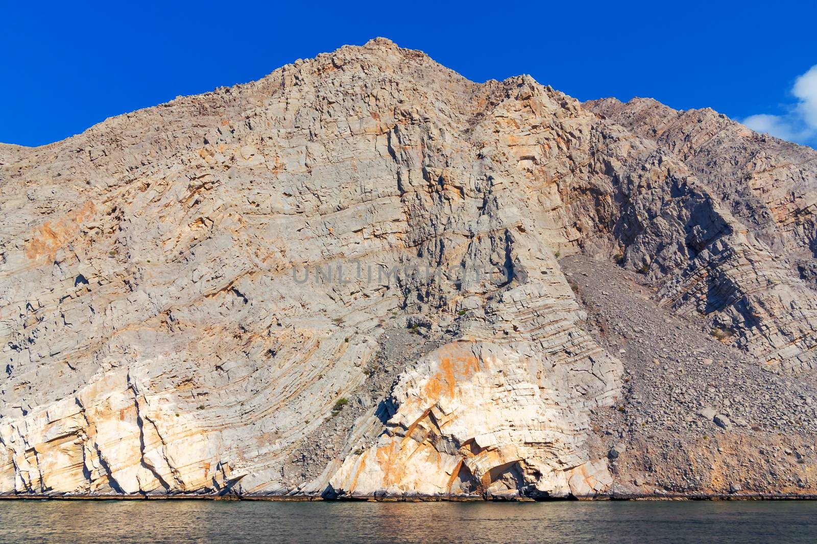 Sea and rocky shores in the fjords of the Gulf of Oman by galsand