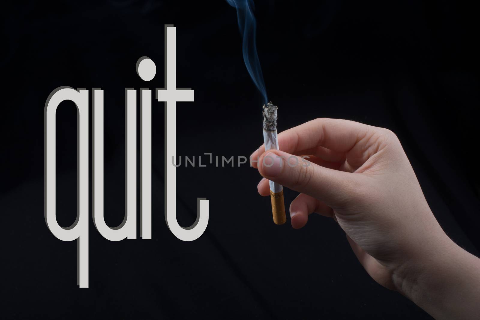 wording QUIT as,  say no smoking concept