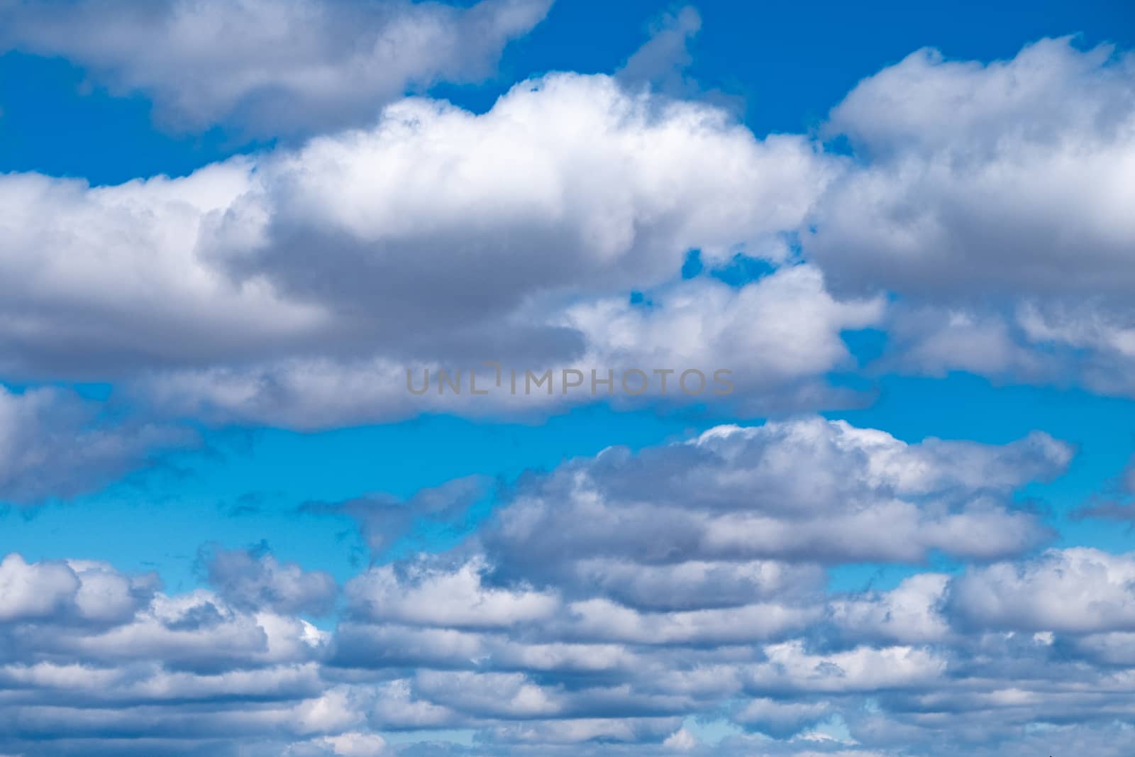 Blue sky background with clouds