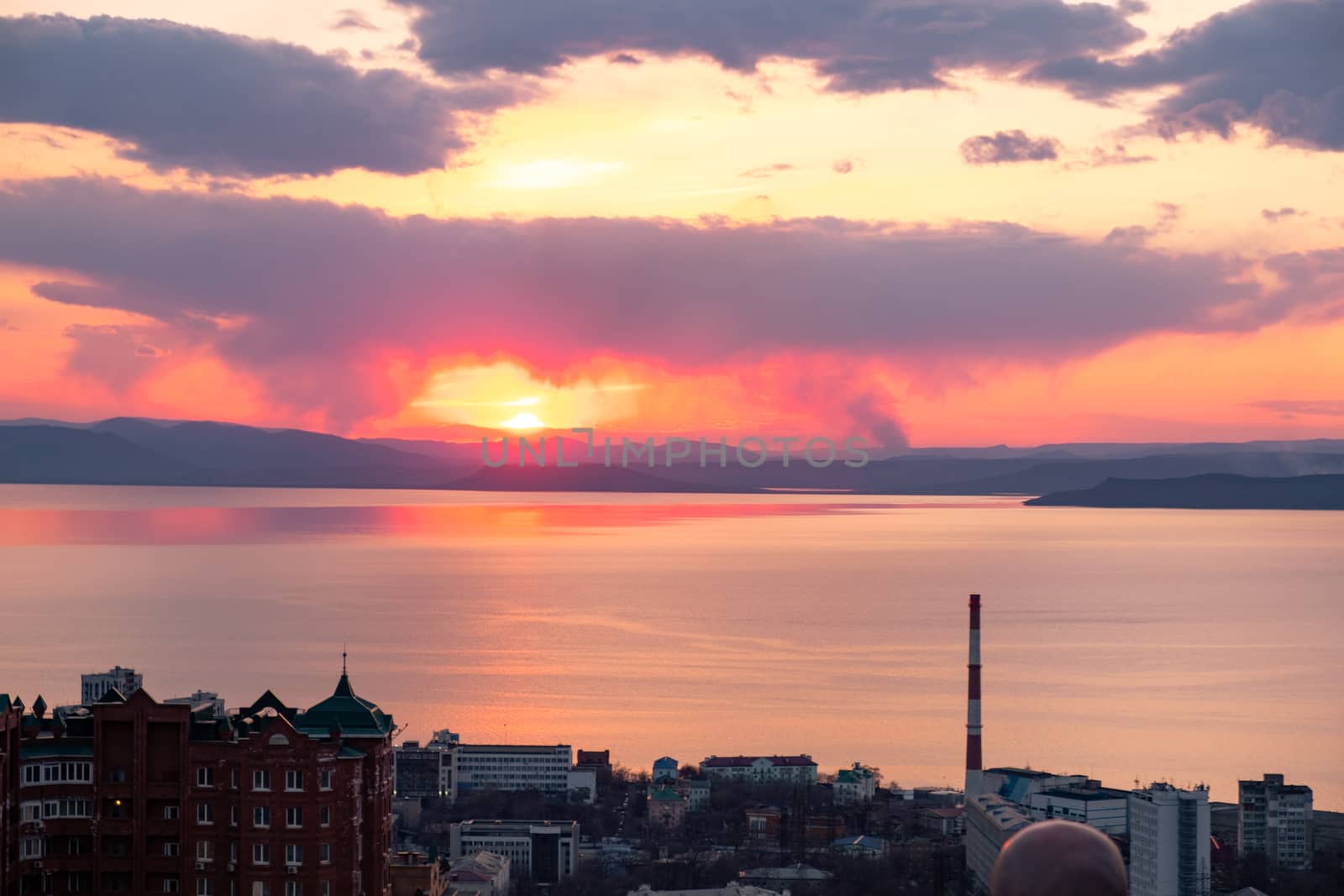 Panoramic view of the city of Vladivostok against the sunset. by rdv27