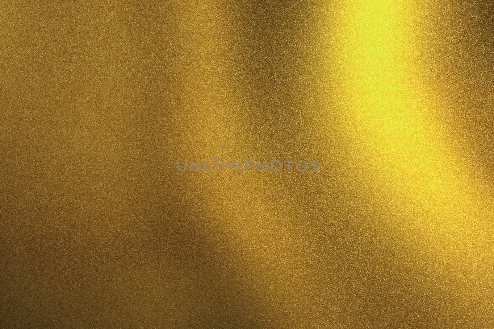 Light shining on golden metallic wall in dark room, abstract texture background