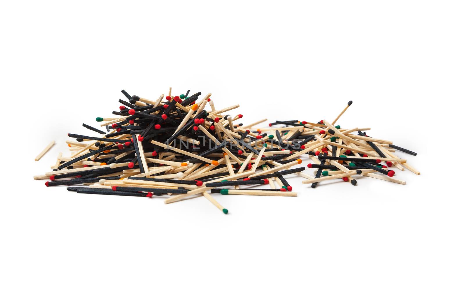 A lot of matches are mixed, of different color, isolated on white background