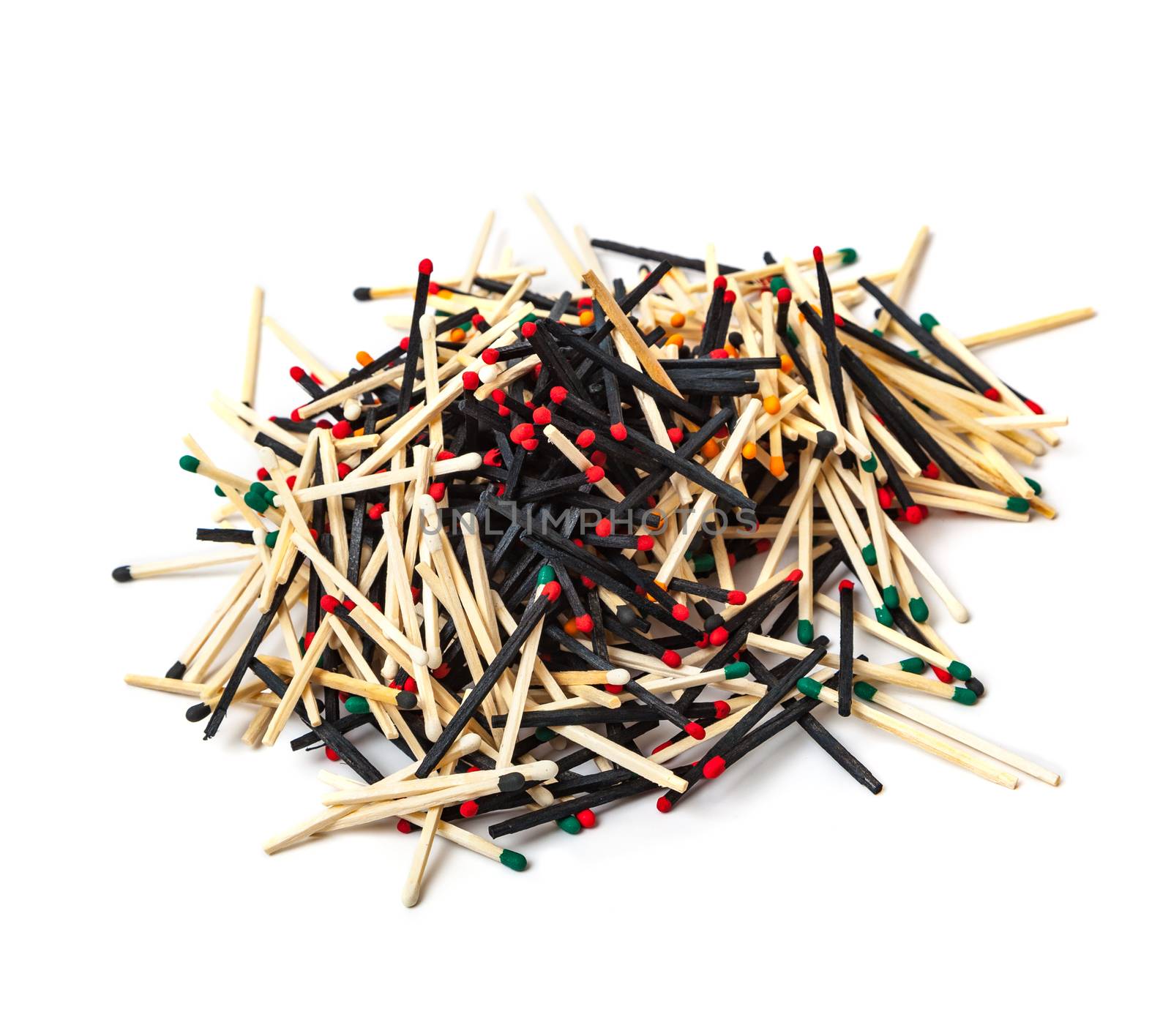 A lot of matches are mixed, of different color, isolated on white background