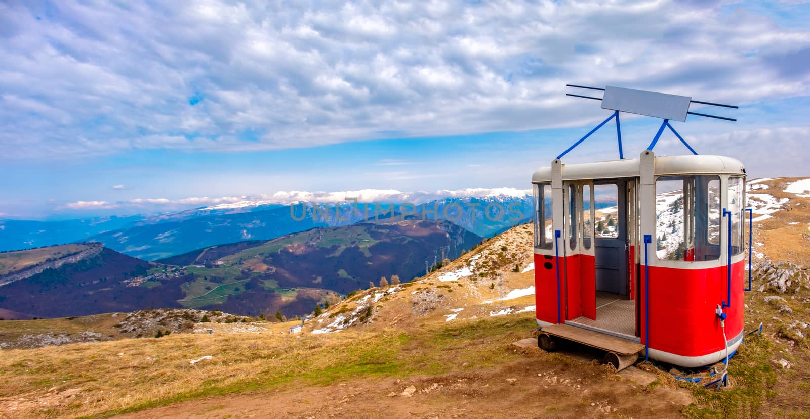 old cable way lift gondola cab abandoned in peak panorama of Monte Baldo mountain near Malcesine in Italy by LucaLorenzelli