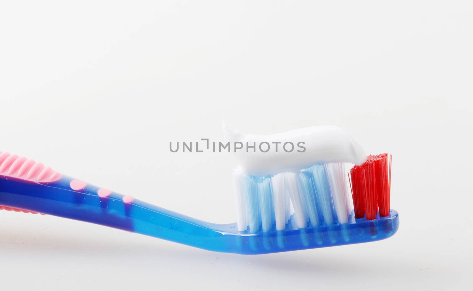 Toothbrush On White Background.  by nenovbrothers