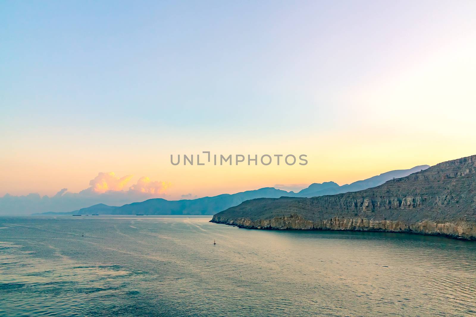 Sea and rocky shores in the fjords of the Gulf of Oman.