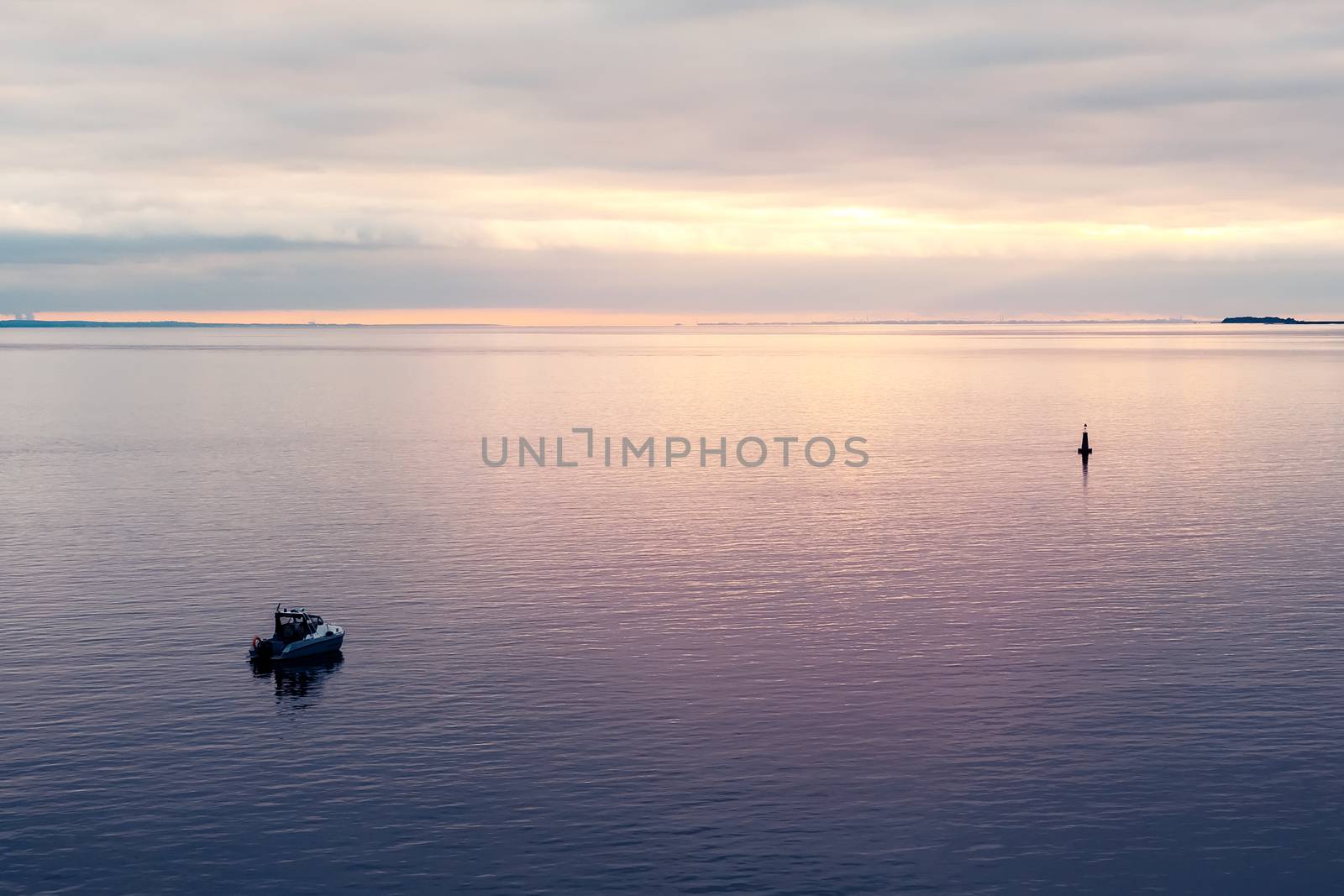 Patrol boat in the Finnish Gulf at sunset.