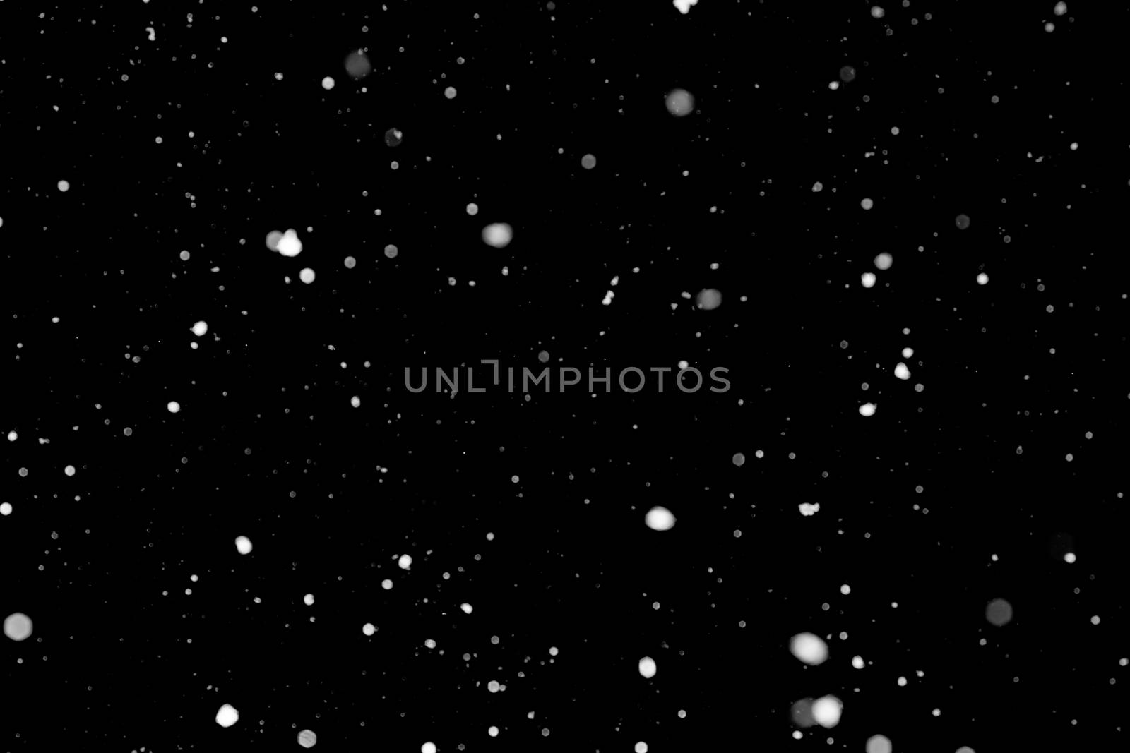 Texture of snow isolated on black background by galsand