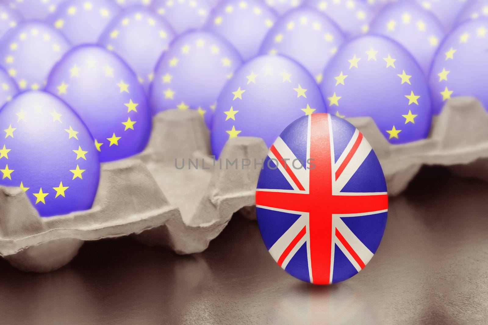 Concept of Brexit is presented from jumping egg with a British flag out of the box with eggs with the flag of the European Union.