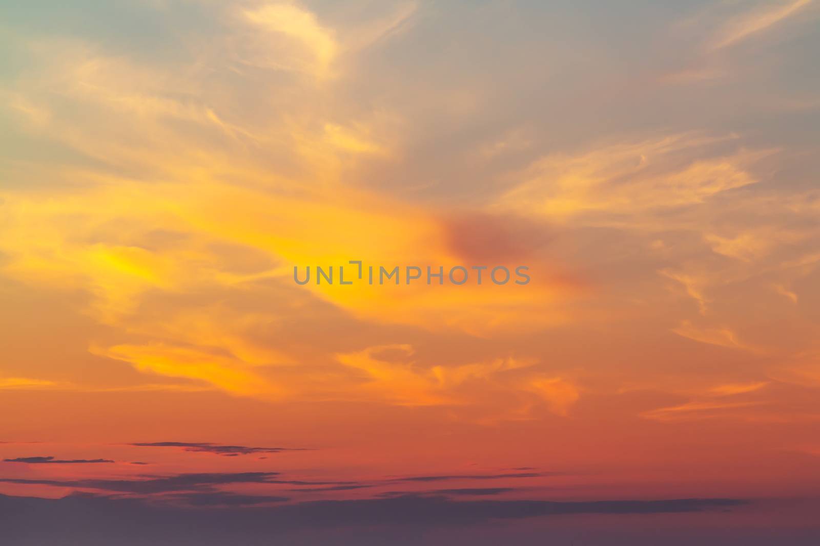 sky during a colorful, bright orange sunset.