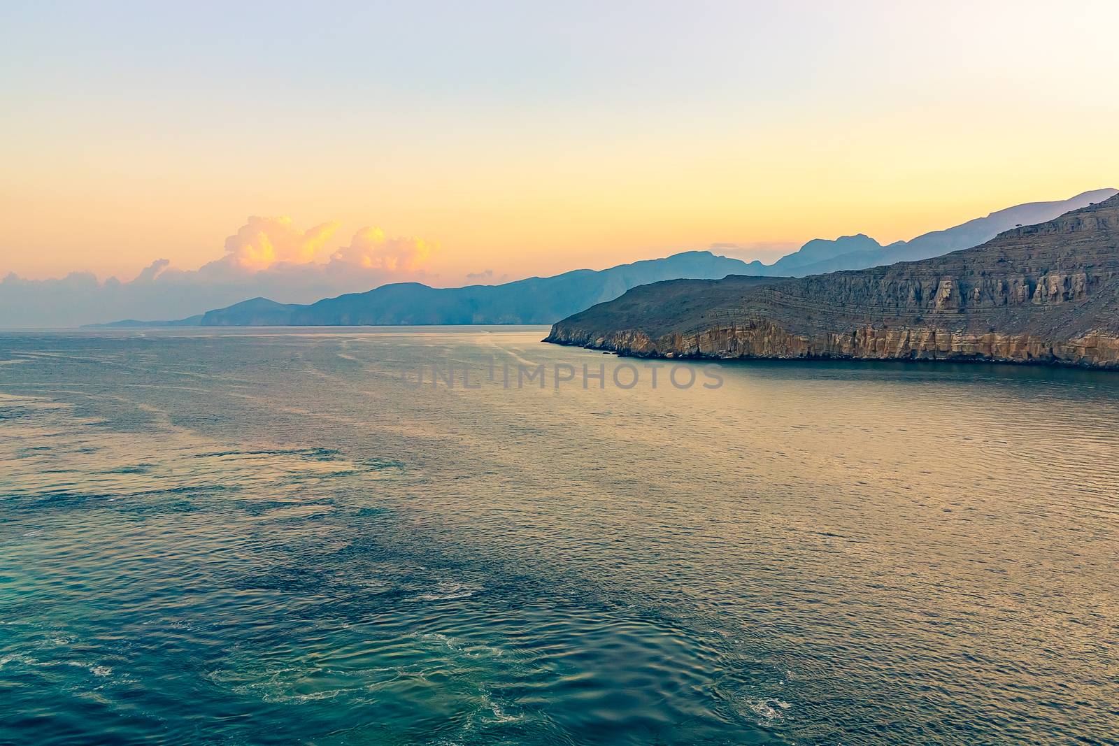 Sea and rocky shores in the fjords of the Gulf of Oman.