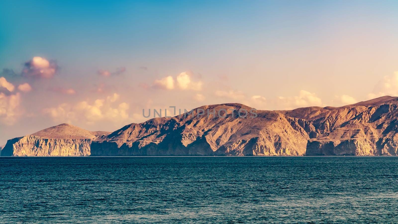 Sea and rocky shores in the fjords of the Gulf of Oman.