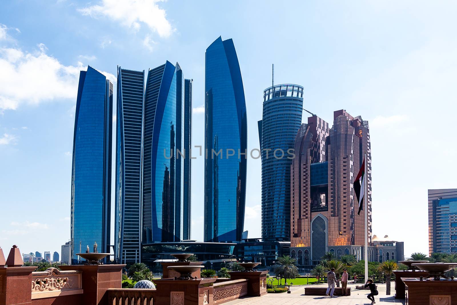 Skyscrapers and landscaping elements in the center of Abu Dhabi near the Emirates Palace by galsand