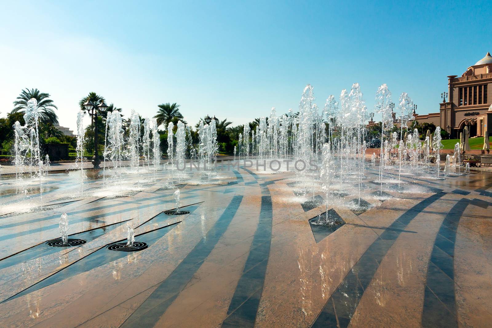 Garden and fountains outdoors of Emirates Palace a luxurious 7 star hotel in Abu Dhabi by galsand