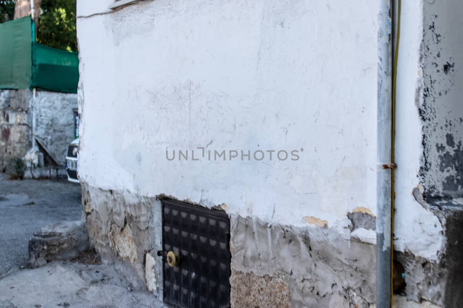 a corner from an old building at urban street. photo has taken from izmir/turkey.