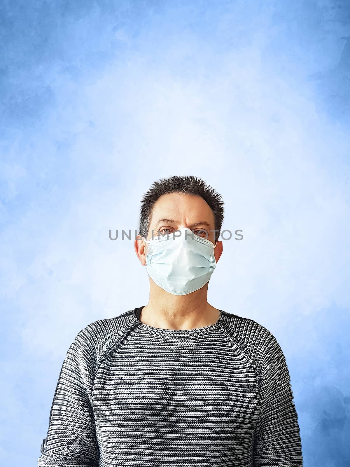 Man with surgical mask by JFsPic