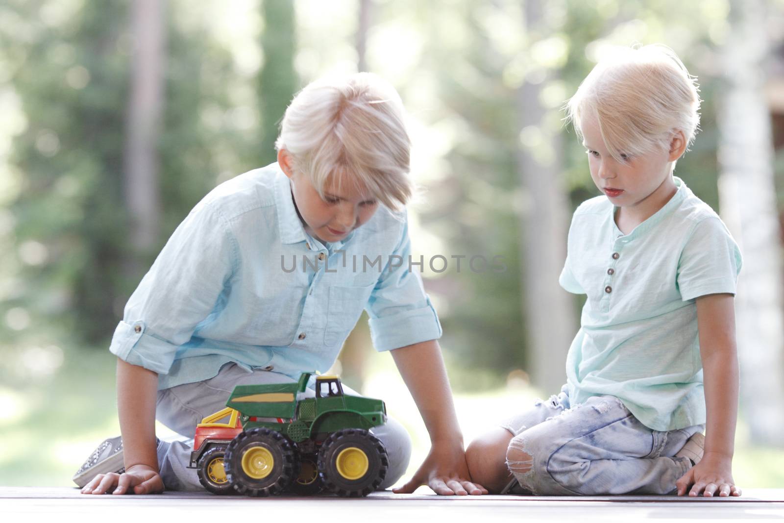 Kids playing with cars by ALotOfPeople