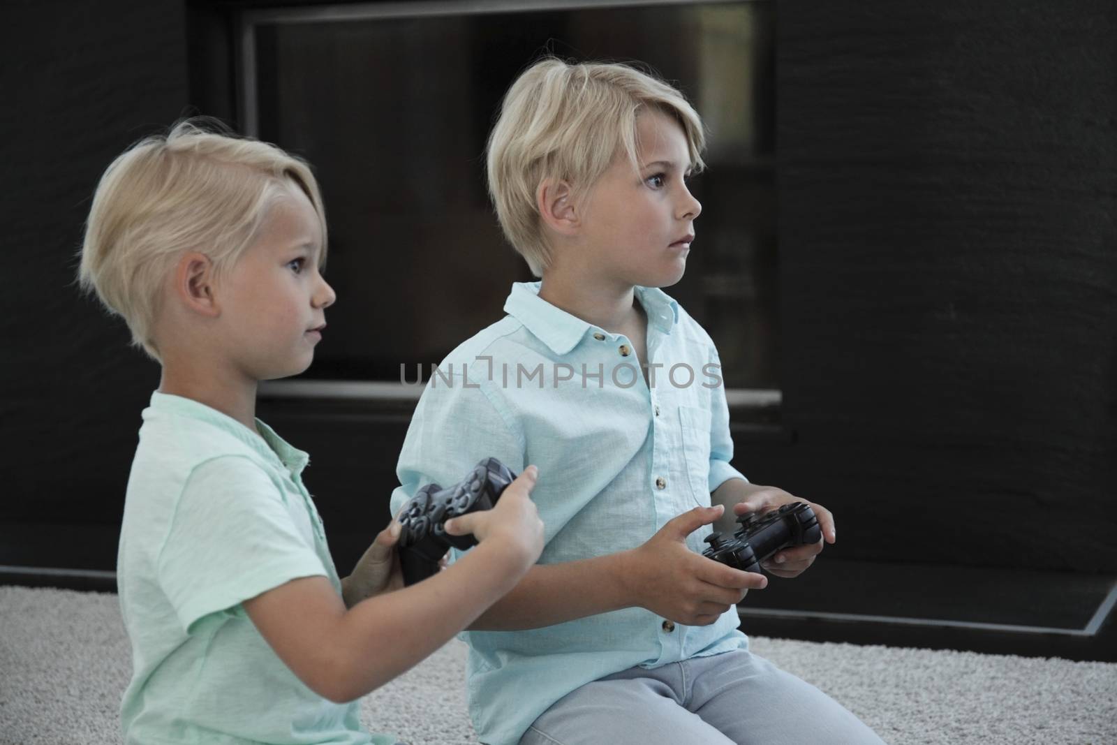 Kids playing video games by ALotOfPeople