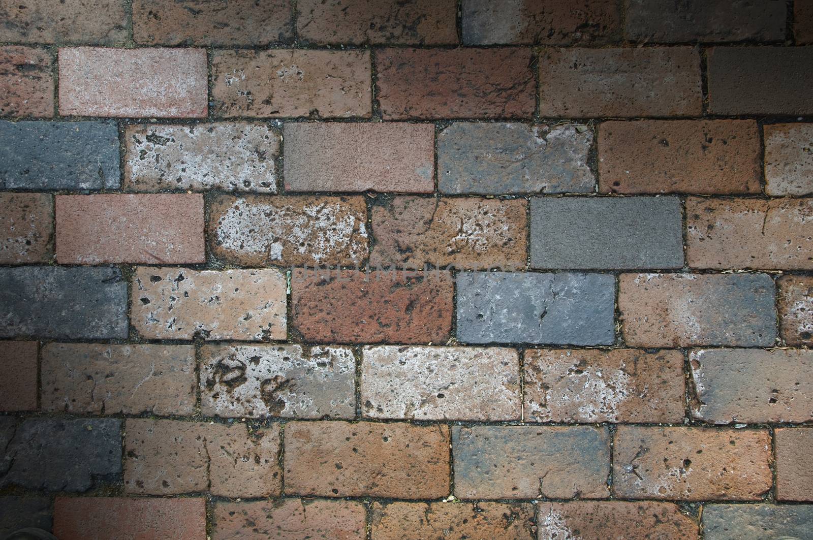 Multi-colored brick work texture lit diagonally by Balefire9