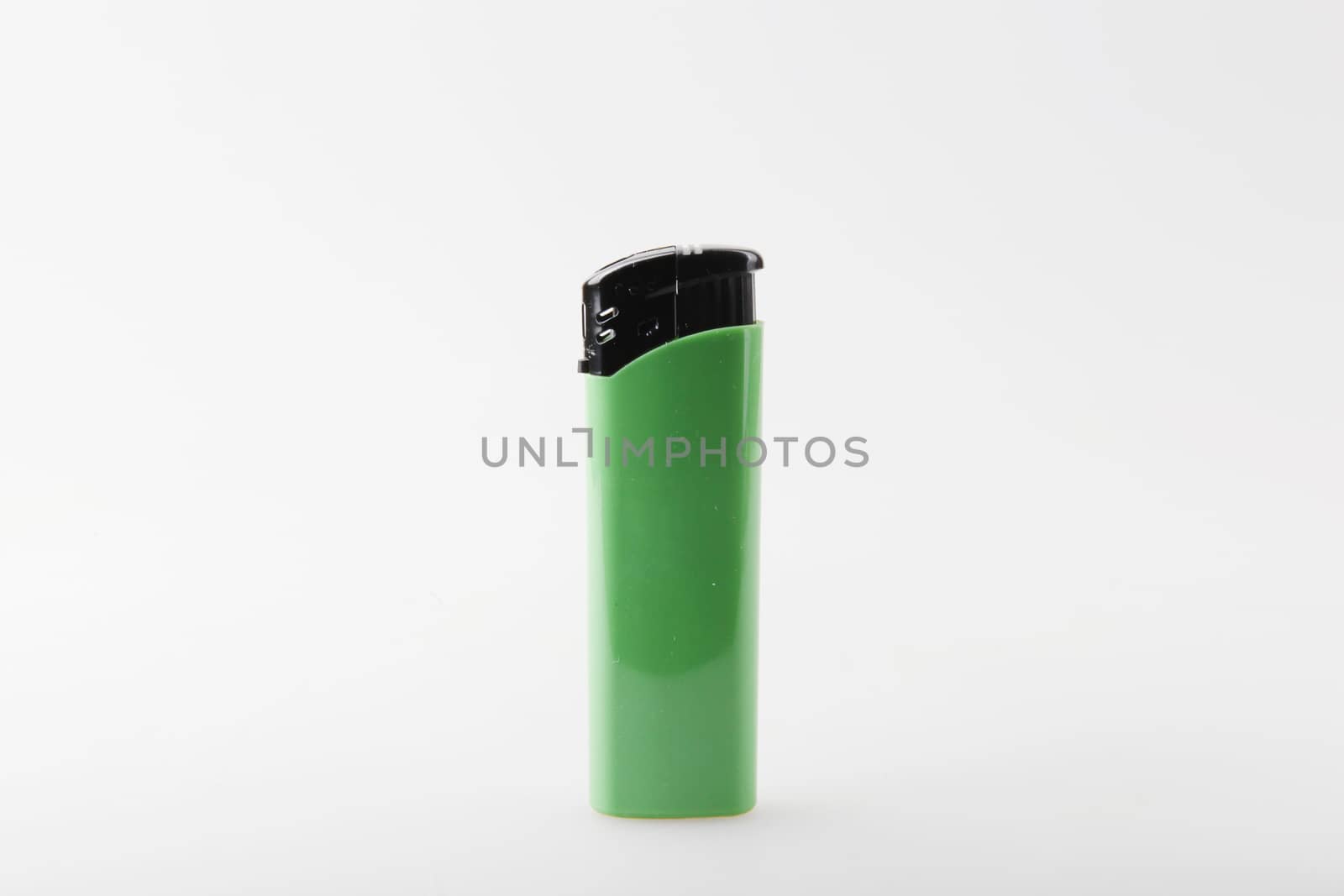 Green Lighter Against White Background