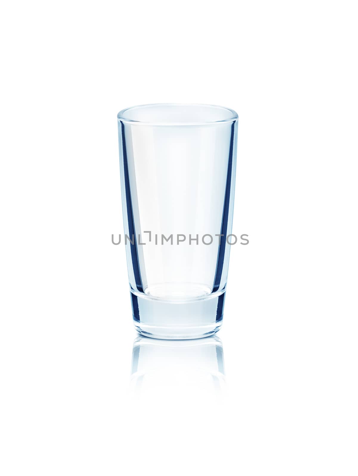 Empty glass on a reflective surface on isolated on white background
